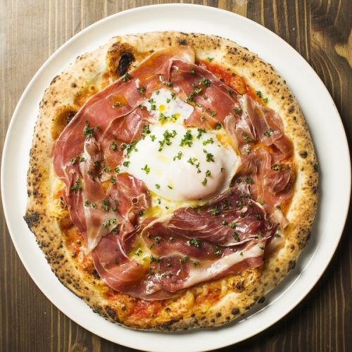 Bismarck pizza with soft-boiled egg and prosciutto