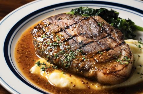 Pork shoulder loin steak with honey mustard gravy sauce