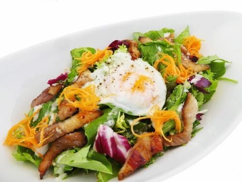 Caesar salad with homemade bacon and soft-boiled eggs