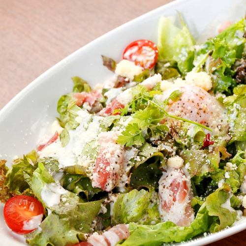 Caesar salad with soft-boiled egg and pancetta