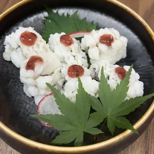 用熱水煮梭魚
