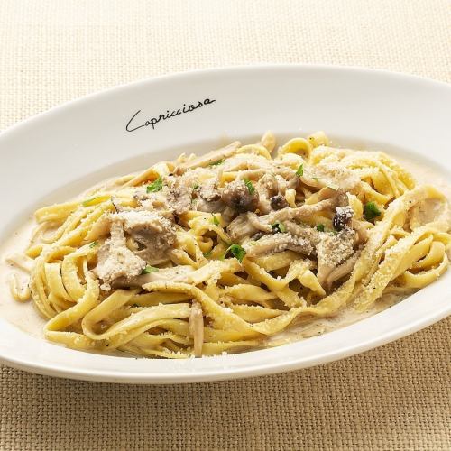 Tagliatelle with porcini and mushroom cream sauce