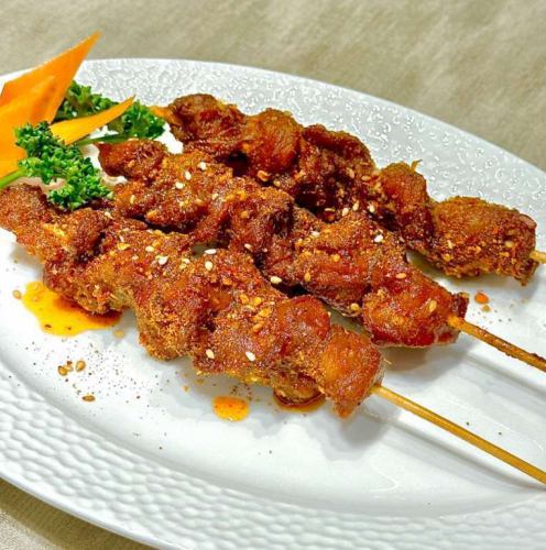 Deep-fried skewered lamb