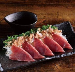 Kagoshima Prefecture bonito covered in green onions (Kyushu soy sauce and Minamisatsuma daidai ponzu sauce)