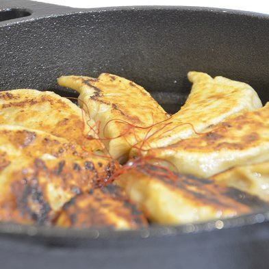 We offer hot gyoza baked on an iron plate!