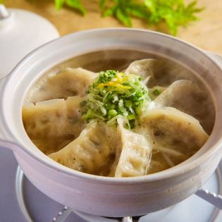 Gyoza dumplings with special silver soup