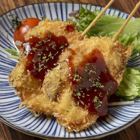 ヤンニョムサーモン串　2本