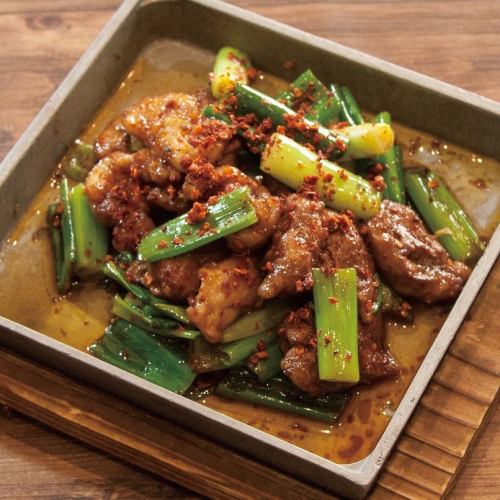 Stir-fried chicken offal and Kujo green onions