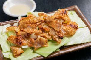 Crispy Grilled Chicken Skin with Garlic A new dish developed to go with beer.