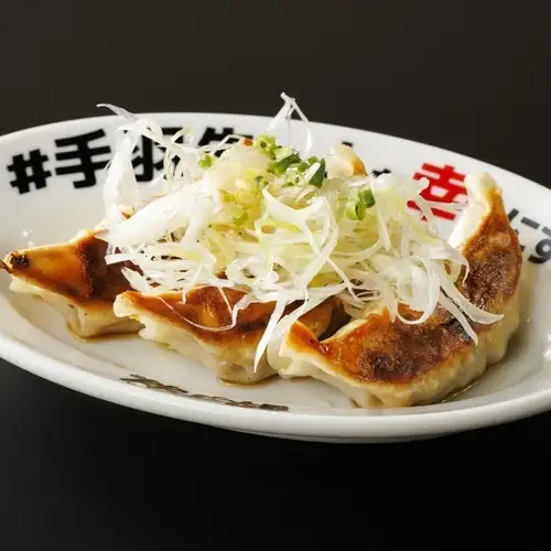 裹滿蔥花的餃子