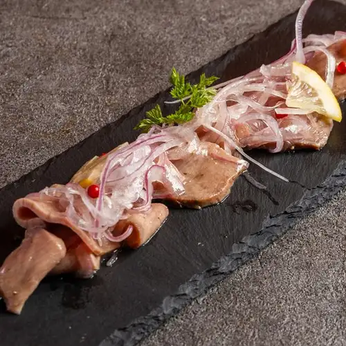 Beef tongue marinated in lemon