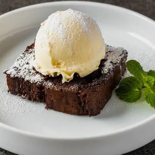Chocolate cake and vanilla ice cream