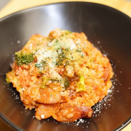 Tomato sauce risotto with sausage and broccoli