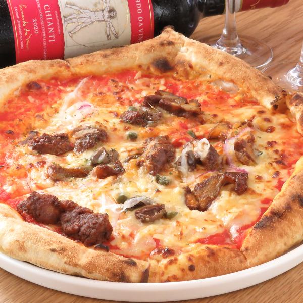 生地から作るこだわりの自家製ピザは、注文を受けてから、４５０℃から５００℃の窯で焼き上げます。薪窯で焼き上げるピッツァは外はカリカリ、中はもっちり、ふっくらした食感をお楽しみ頂けます。