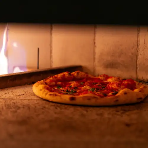 Authentic pizzas baked in our in-house oven.