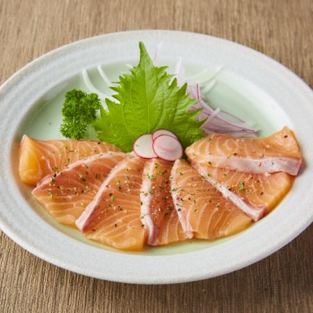 Fresh raw fish carpaccio with lemon