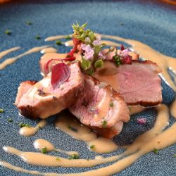 Sauteed duck breast with orange sauce