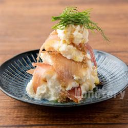 Potato salad and prosciutto mille-feuille