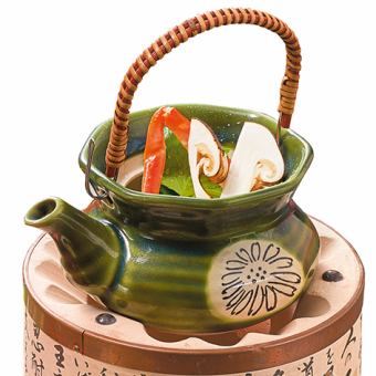 Matsutake mushroom in earthenware pot