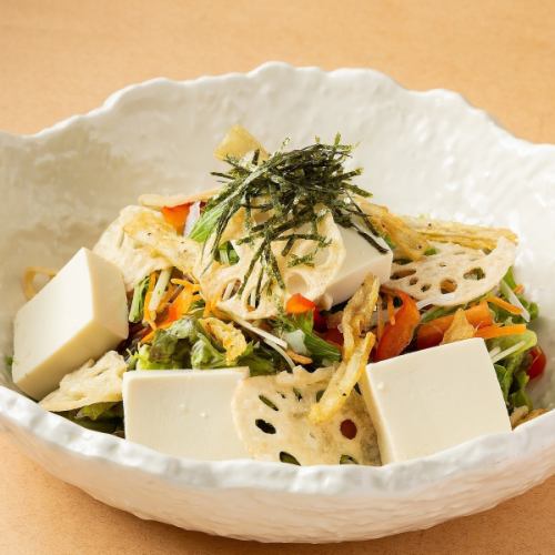 Root vegetable chips and tofu sesame dressing salad