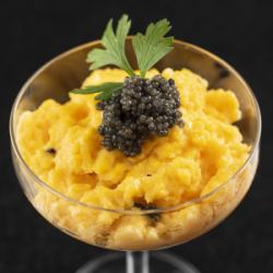 Luxury scrambled eggs with caviar and truffles