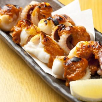 Grilled sea urchin with squid geso