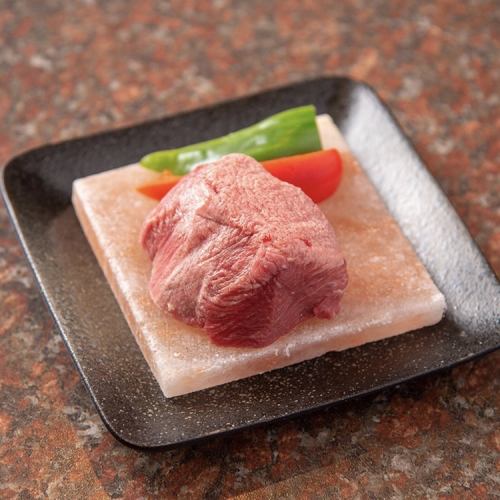 Top thick sliced tongue grilled with rock salt