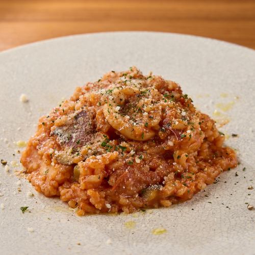 Tomato risotto with squid and eggplant