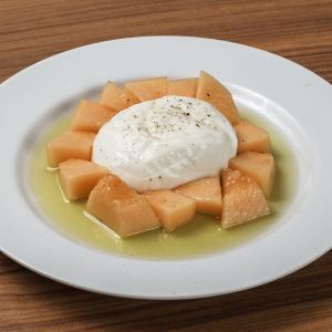 Seasonal fruits and burrata cheese