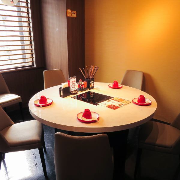 There are two private rooms with a round table that can accommodate up to 14 people, so they're perfect for private gatherings!