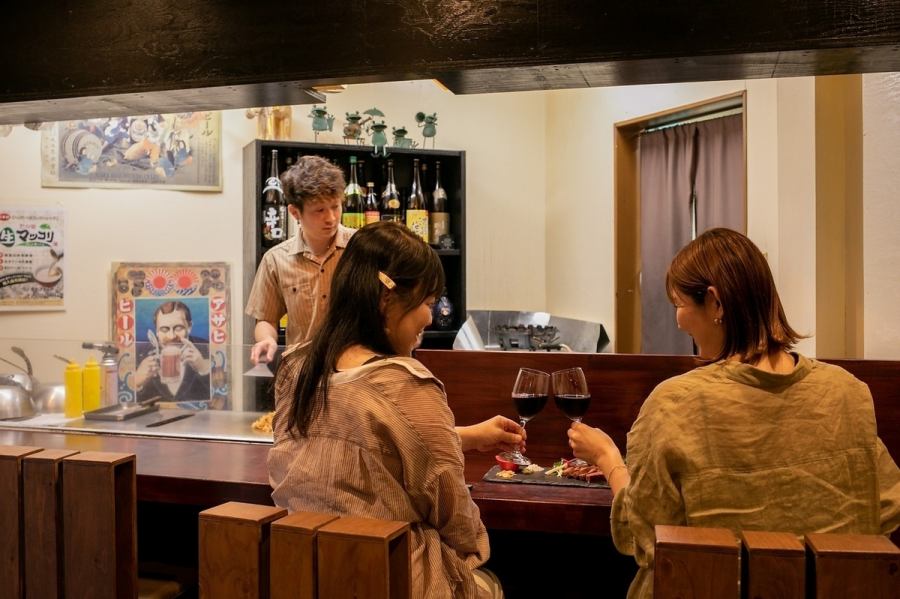 Cheers at the counter. You'll want to order everything as the teppanyaki dishes are cooked right in front of you.