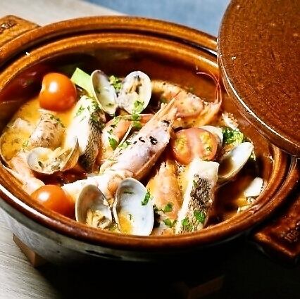 Bouillabaisse -red shrimp served in a clay pot
