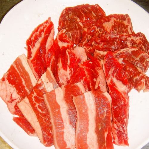 Assortment of three types of grilled meat