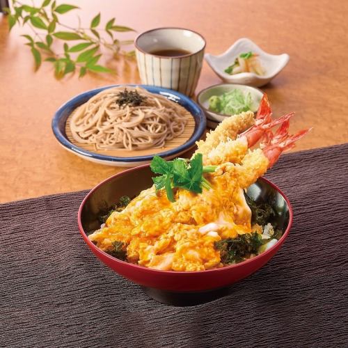 Large shrimp tempura rice bowl with fluffy egg and noodles