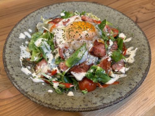 Caesar salad with soft-boiled egg and grilled bacon