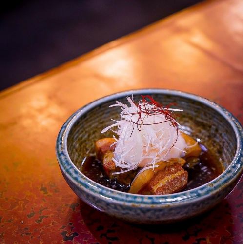 Braised pork cubes topped with a soft-boiled egg