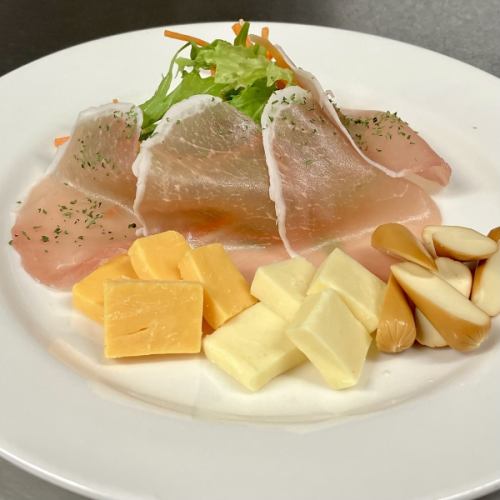 Assorted raw ham and 3 types of cheese