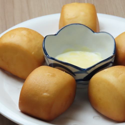 Bite-sized fried bread with milk