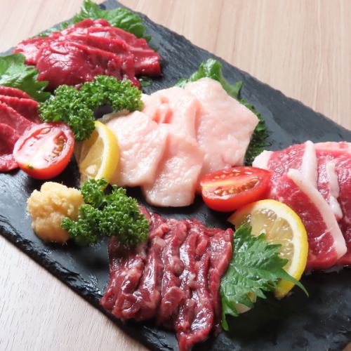 Assortment of three premium horse sashimi dishes