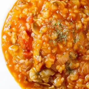 Thick-cut bacon and mushroom tomato risotto