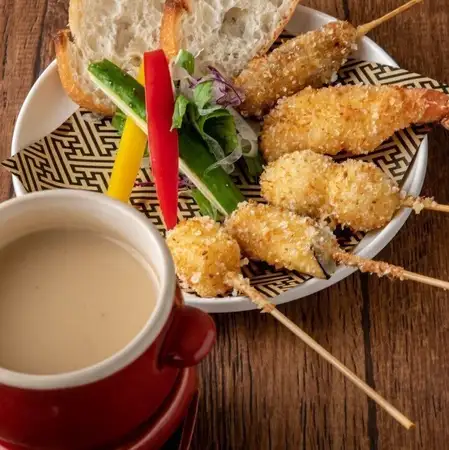 濃厚ウニソースで食べる串カツ ウニージョ