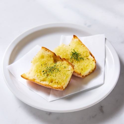 Baguette *Served with olive oil / Garlic baguette