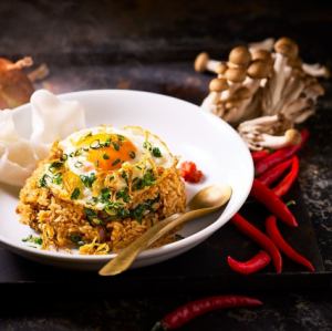 Nasi goreng (served with very spicy fresh chili peppers) / Squid ink and Hakata cod roe pilaf