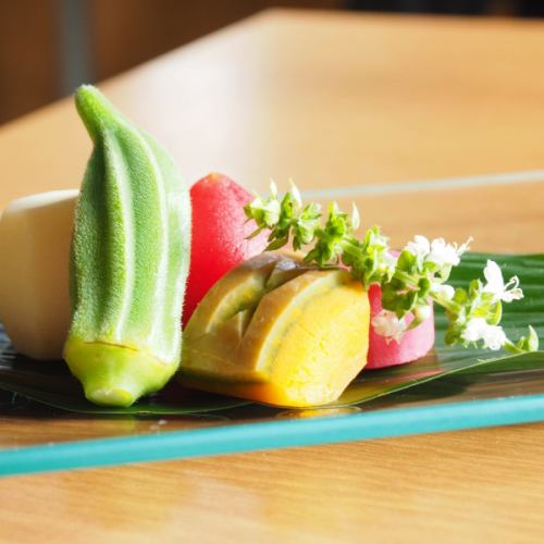 We offer seasonal vegetable dishes on a blackboard menu