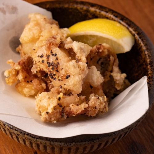 Homemade fried chicken skin with ponzu sauce