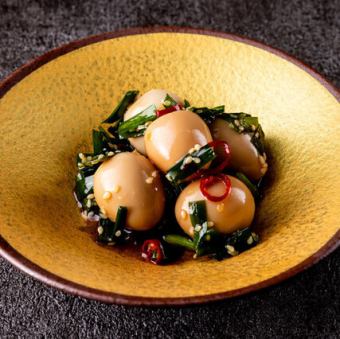 Quail eggs and chives pickled in soy sauce