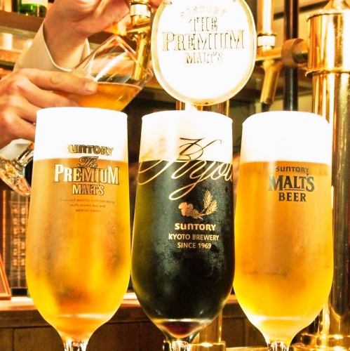 Three types of draft beer pouring