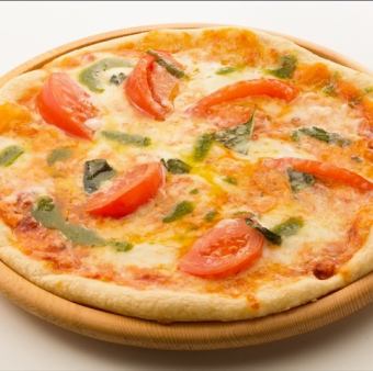 Pizza with special ripe tomatoes and basil sauce