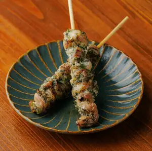 Chicken neck skewers with dill and pickled plum paste