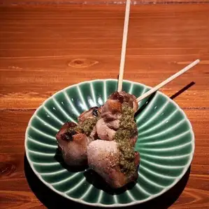 Lamb tongue skewers with basil and lemon